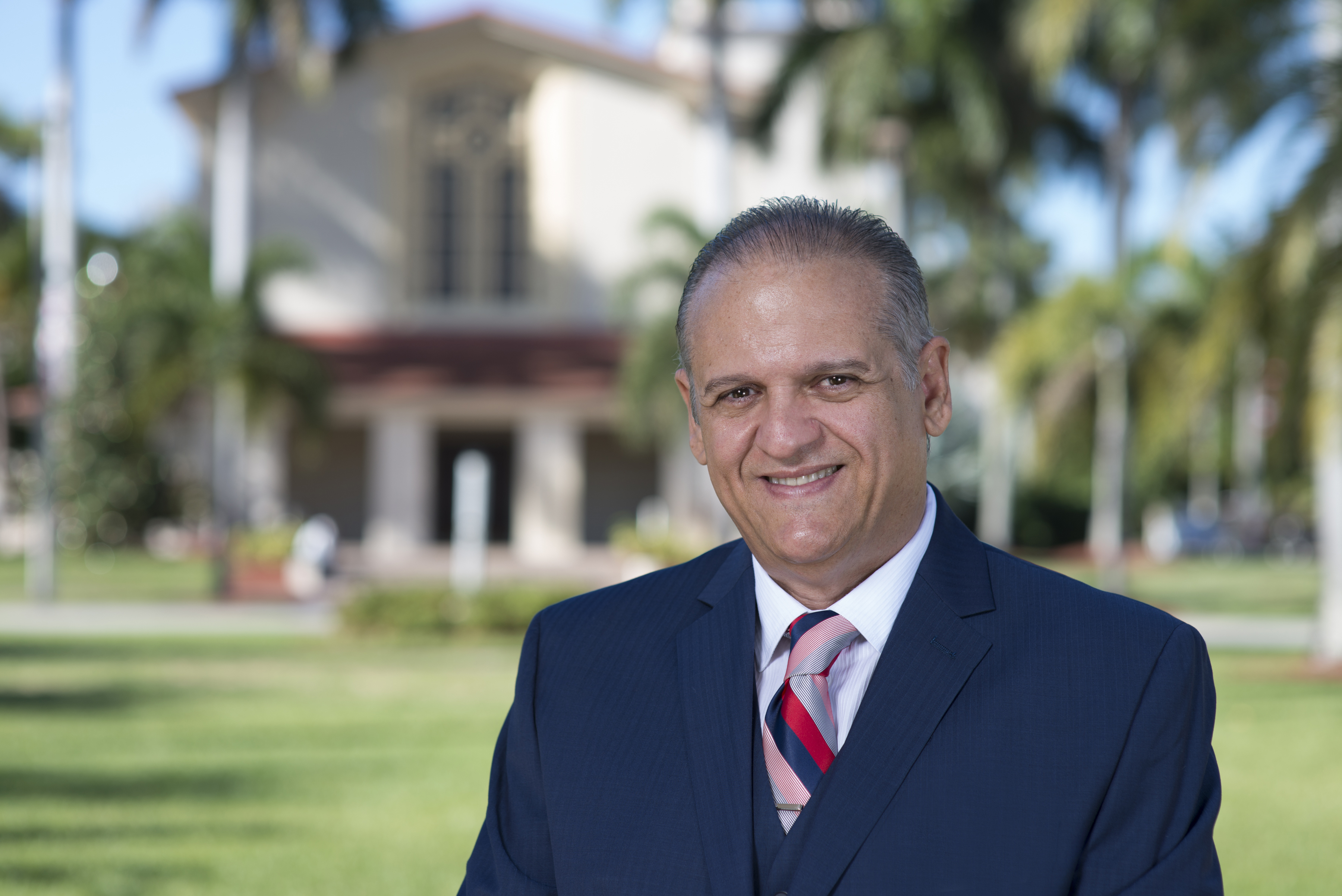 Evelio Velis, Ph.D., MD